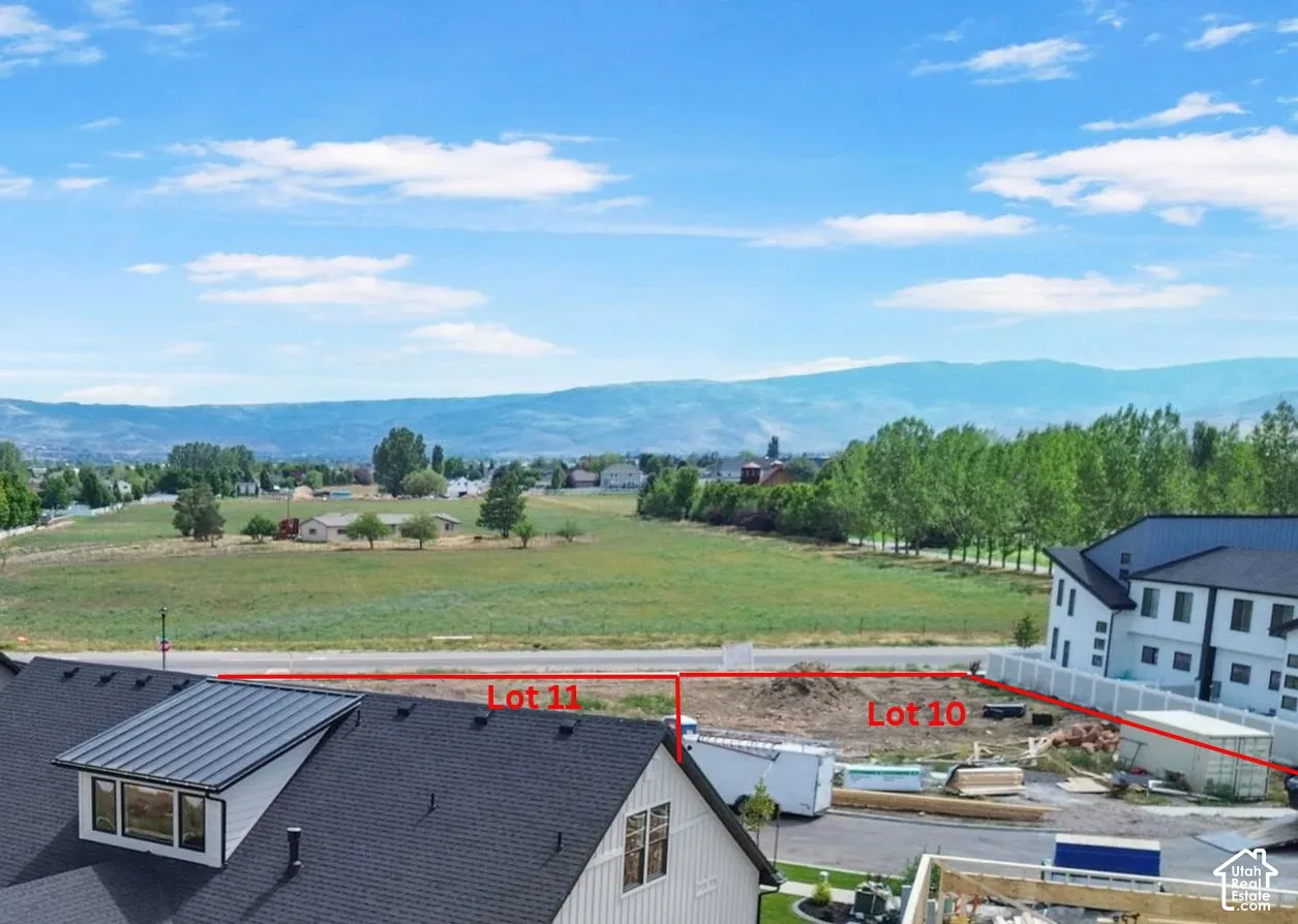 Undeveloped residential lots featuring mountain backdrops and open space surroundings