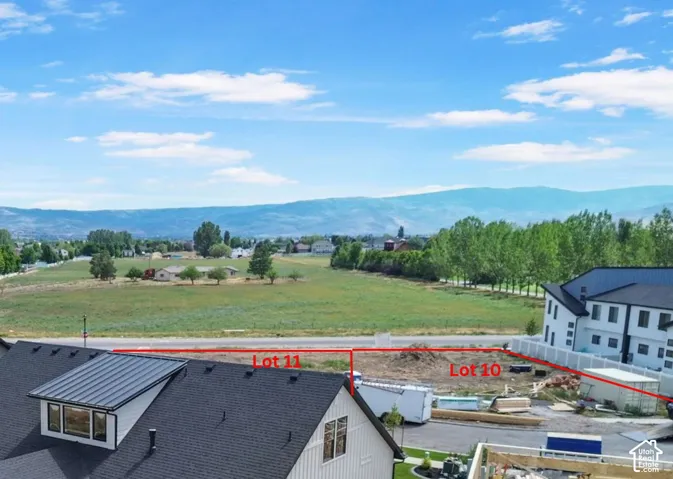 Undeveloped residential lots featuring mountain backdrops and open space surroundings