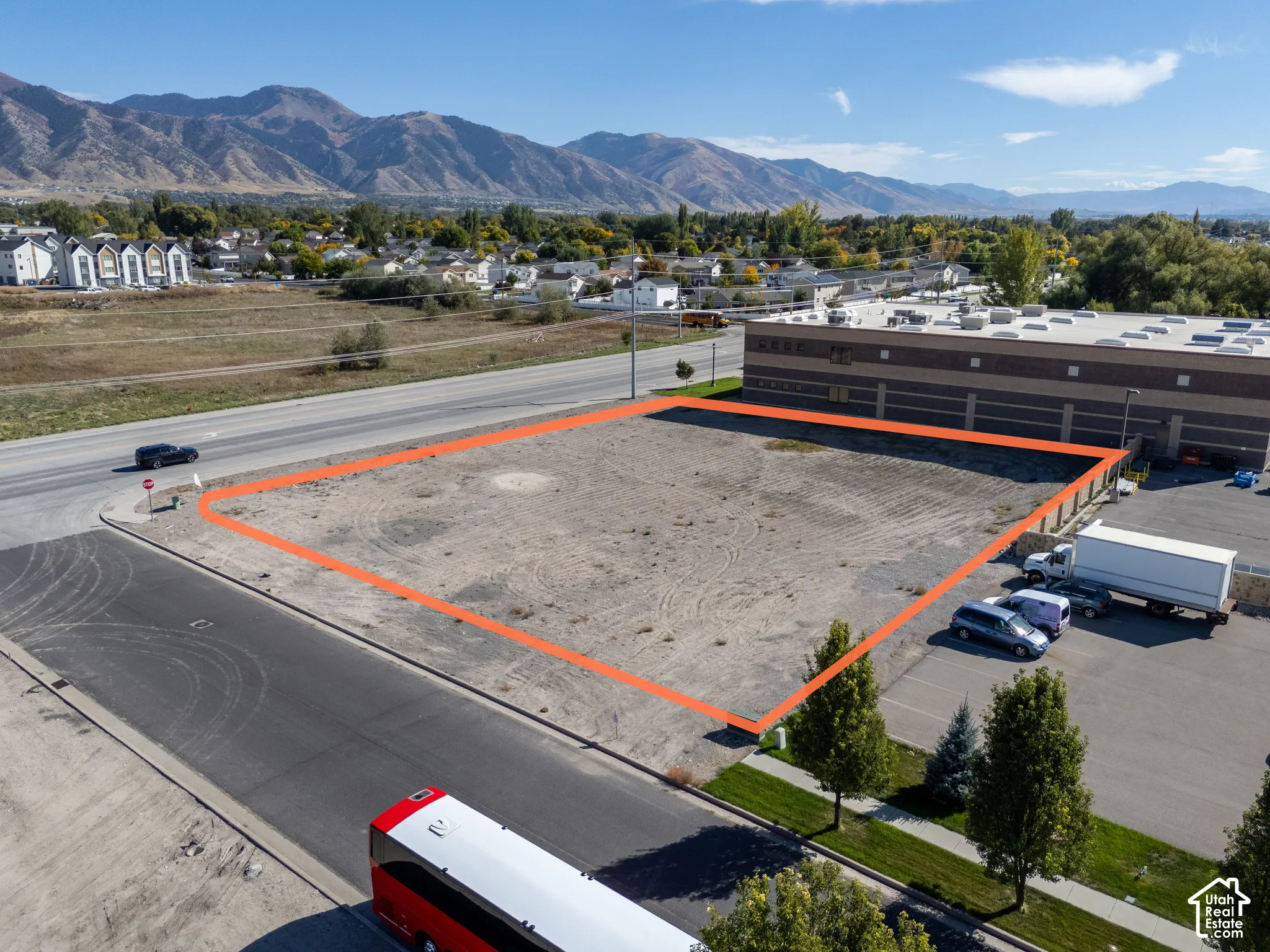 Corner lot featuring prominent street frontage and mountain backdrop