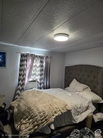 Textured ceiling with a flush-mount LED light fixture and integrated through-wall air conditioning unit