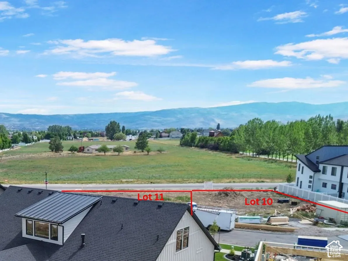 Undeveloped residential lots featuring mountain backdrops and open space surroundings