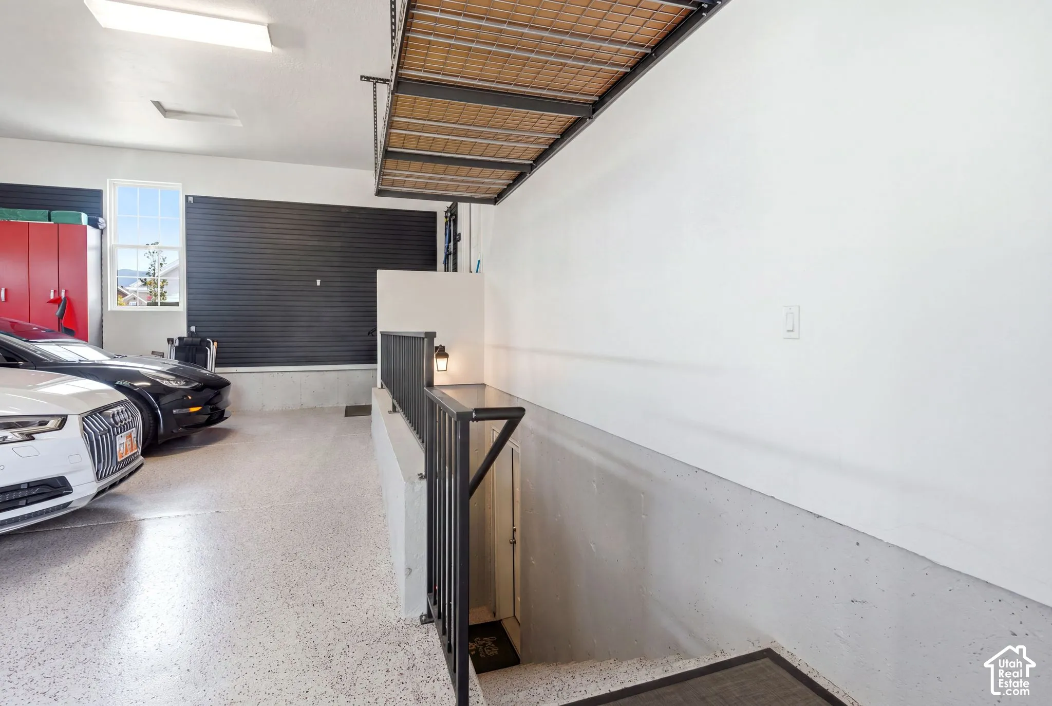 3-car garage showing designated stairs/entrance to ADU