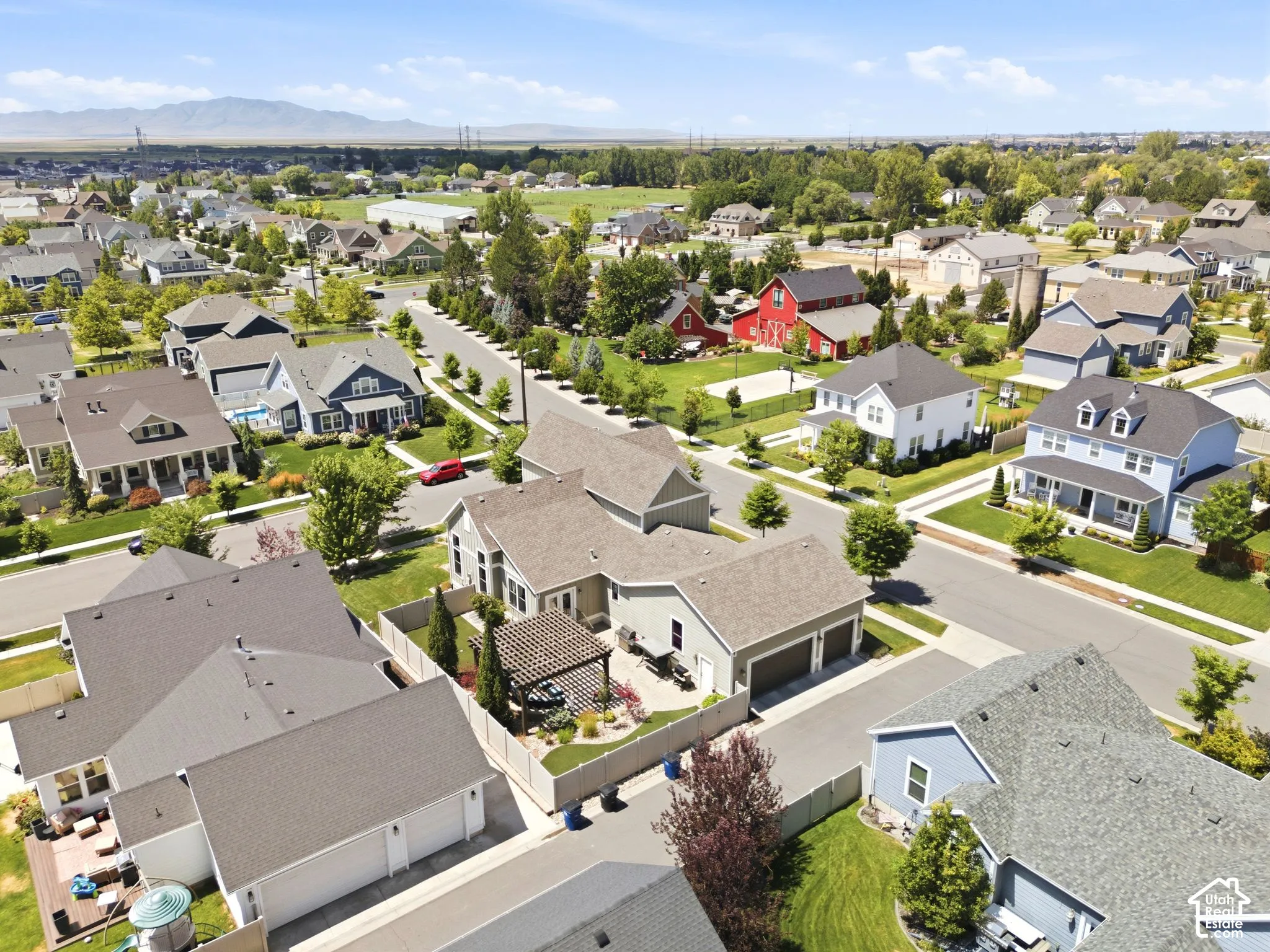 Aerial view of the south side of the home and garage