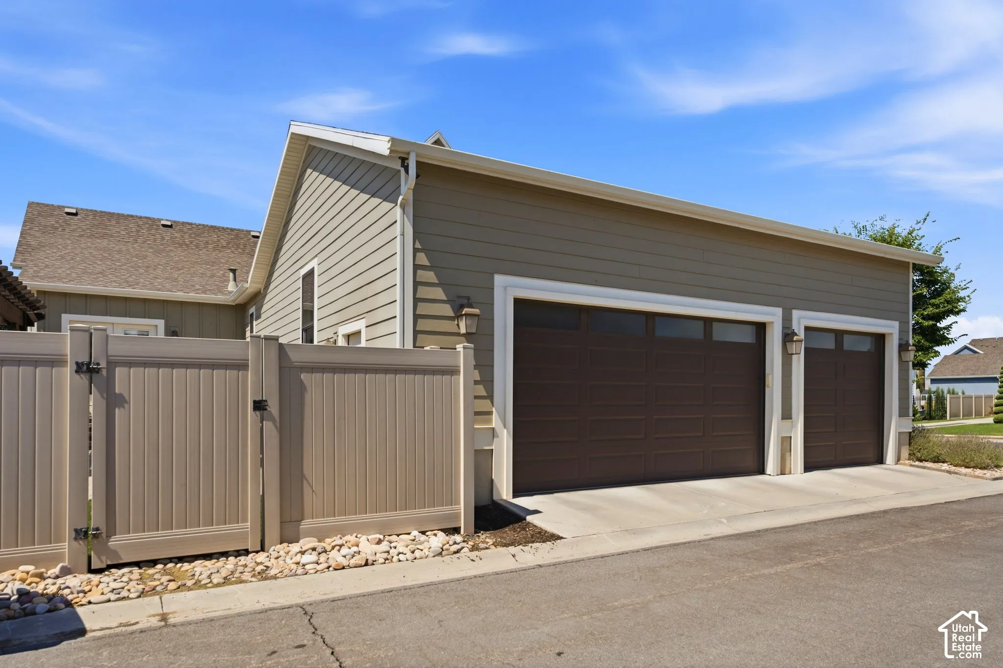 3-car garage, fence to back yard