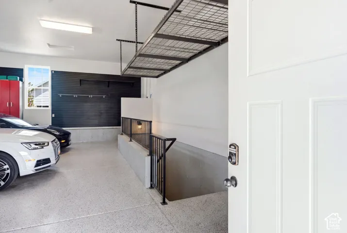 3-car garage showing designated stairs/entrance to ADU