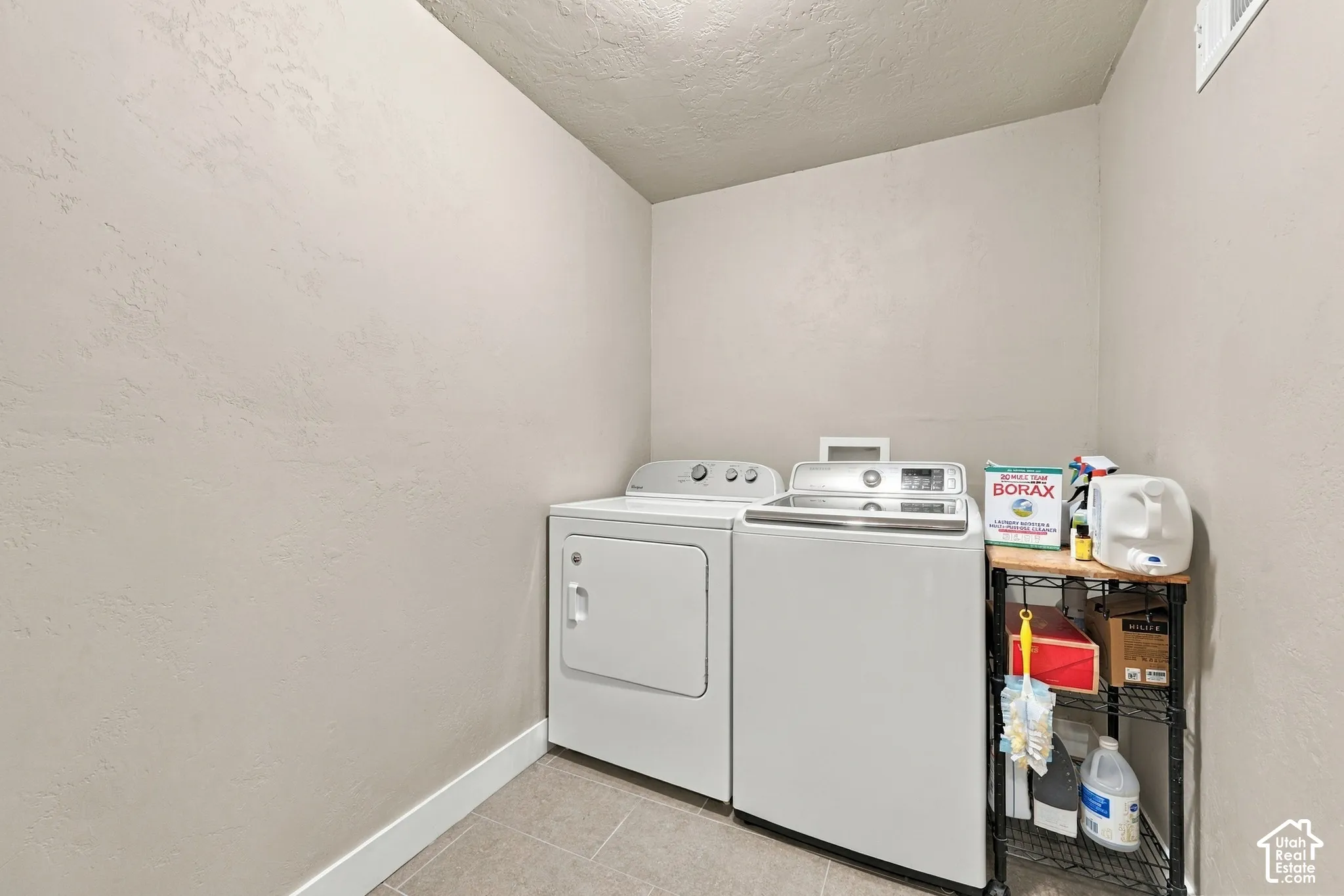 Large centrally located laundry and storage space