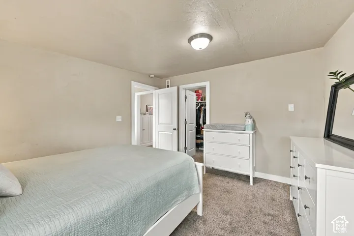 Bedroom 1 Primary suite with two-panel interior doors