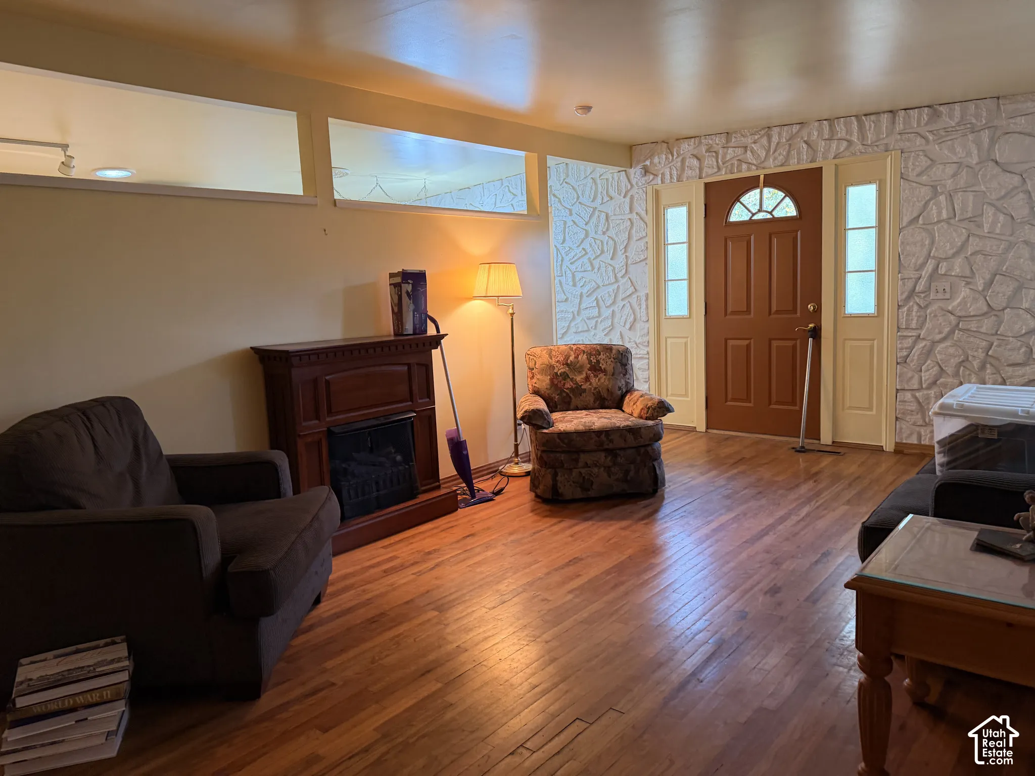 This room backs up to the kitchen, connected by two open pass-throughs