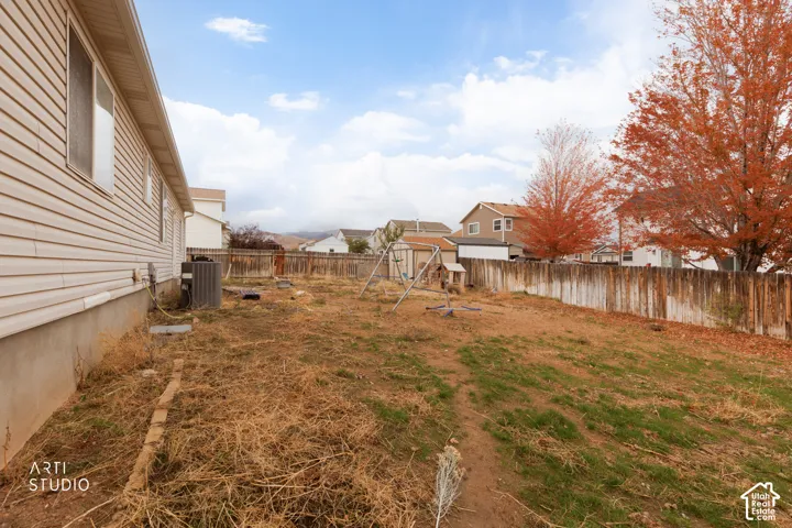Exterior lot featuring full wood fence enclosure and siding