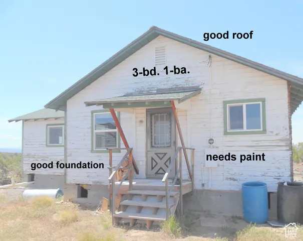 Exterior view featuring a single-story structure with gable roofing, wood-frame construction, and a covered front entry porch with stairs
