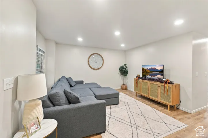 Recessed lighting and wood-finish flooring