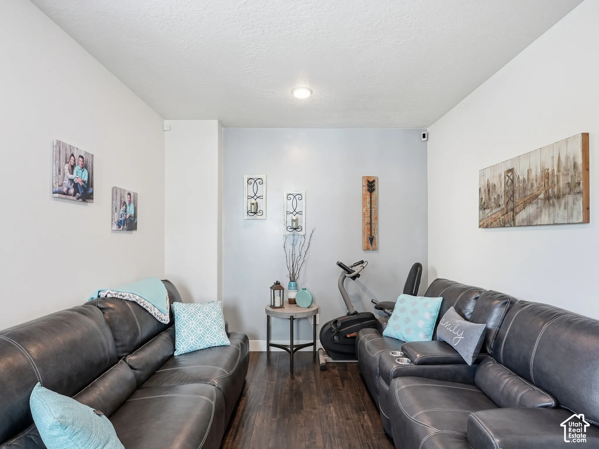Interior space featuring wood-finish flooring, neutral wall paint, and recessed lighting