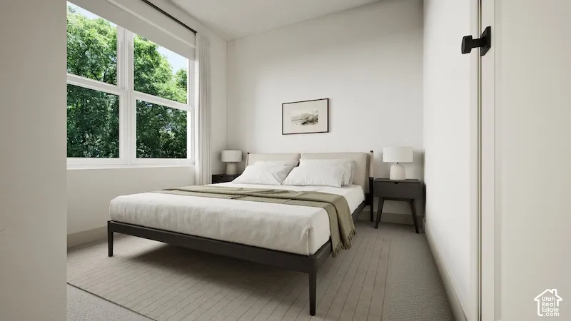 Neutral-toned walls, high-profile multi-pane window, and wall-to-wall carpeting