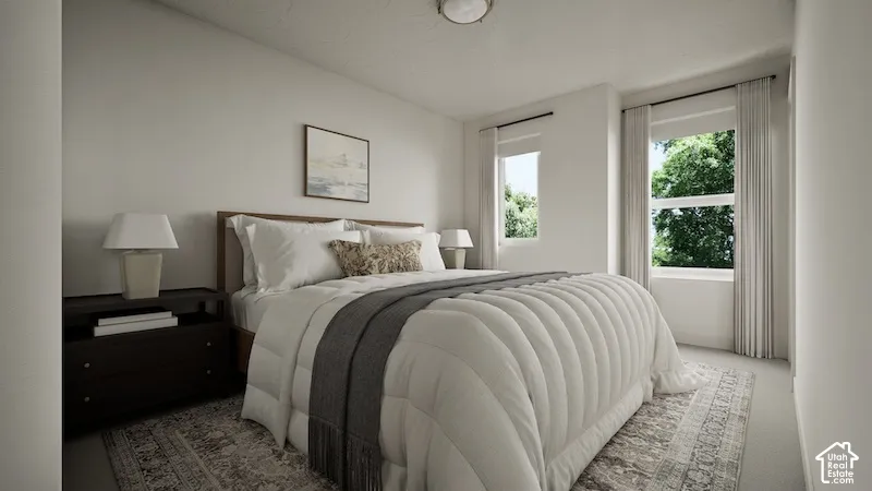 Neutral-toned walls, dual window configuration, and recessed ceiling lighting