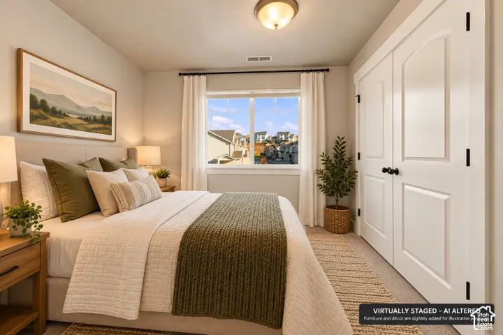 Neutral interior featuring neutral wall paint, carpeted flooring, large window with natural light, and double-panel doors with matte black hardware