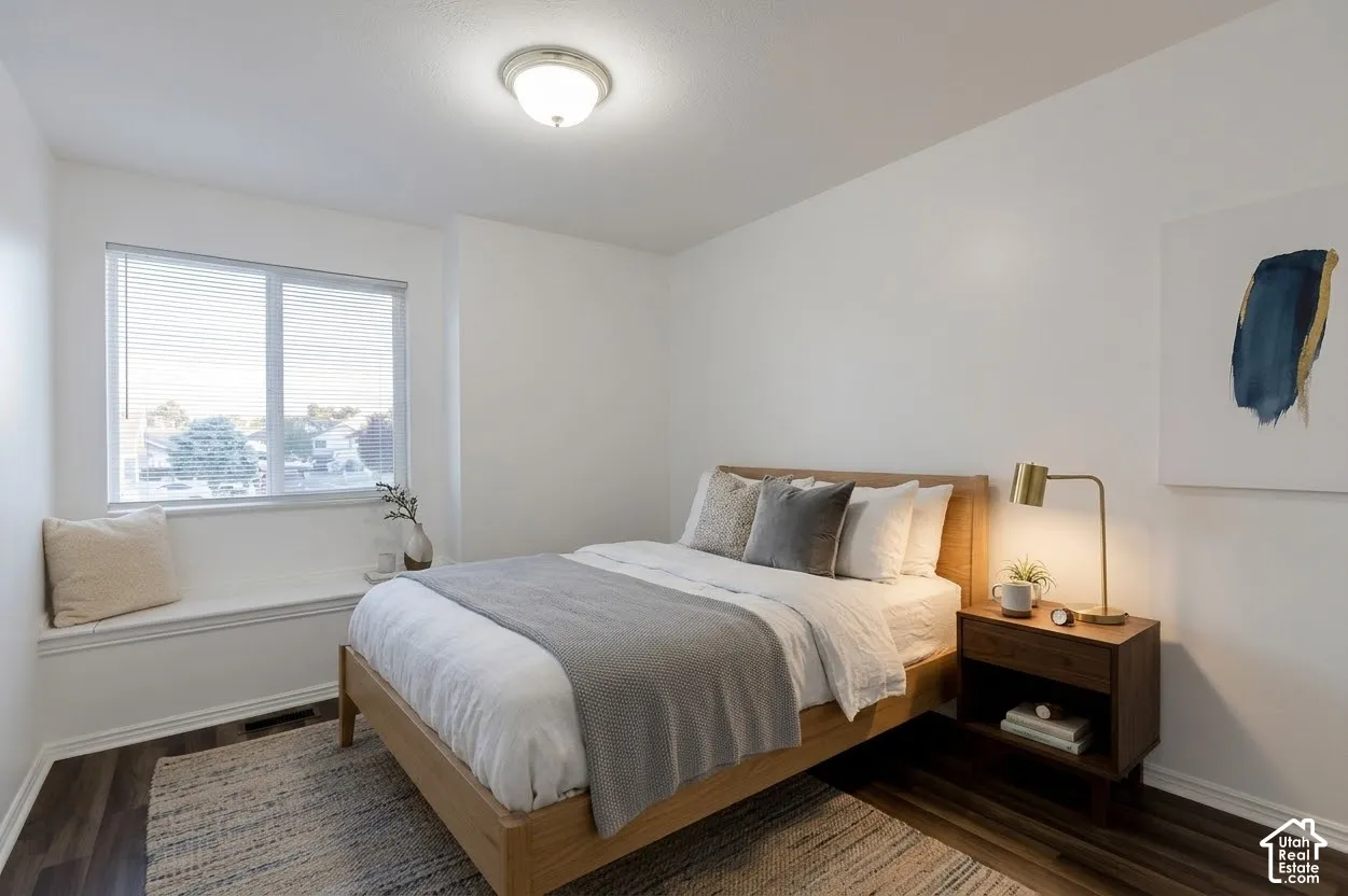 Wood-finish flooring, built-in window bench, and flush-mount ceiling lighting