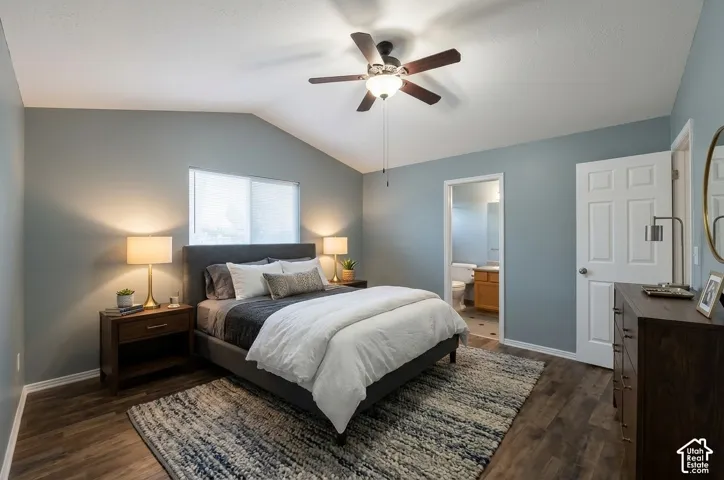 Vaulted ceiling, wood-finish flooring, and a ceiling fan with integrated lighting