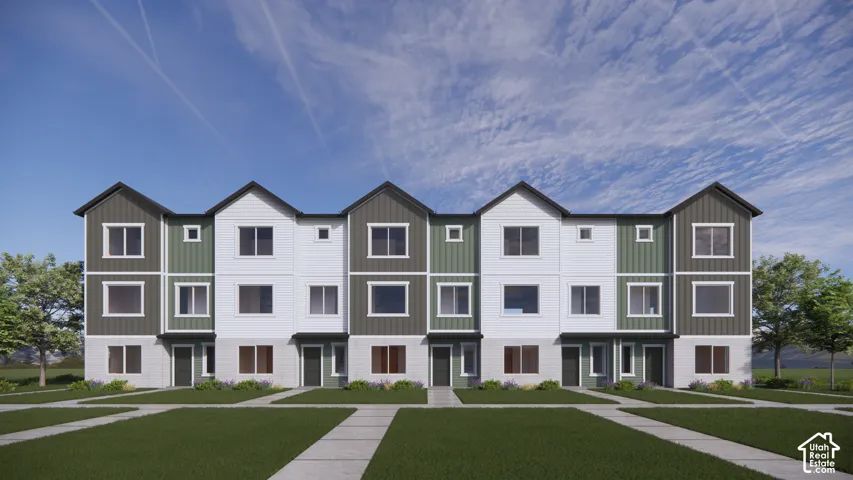 Multi-family residential building featuring a mixed-material exterior, vertical paneling, gabled rooflines, and individual ground-level entryways