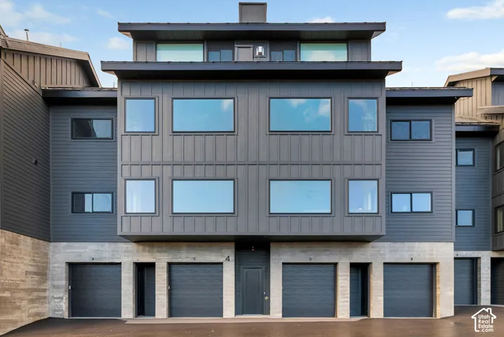 Front of unit, parking on level one, 2-bed units on level 2.