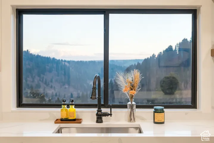 Large picture window, undermount stainless steel sink.