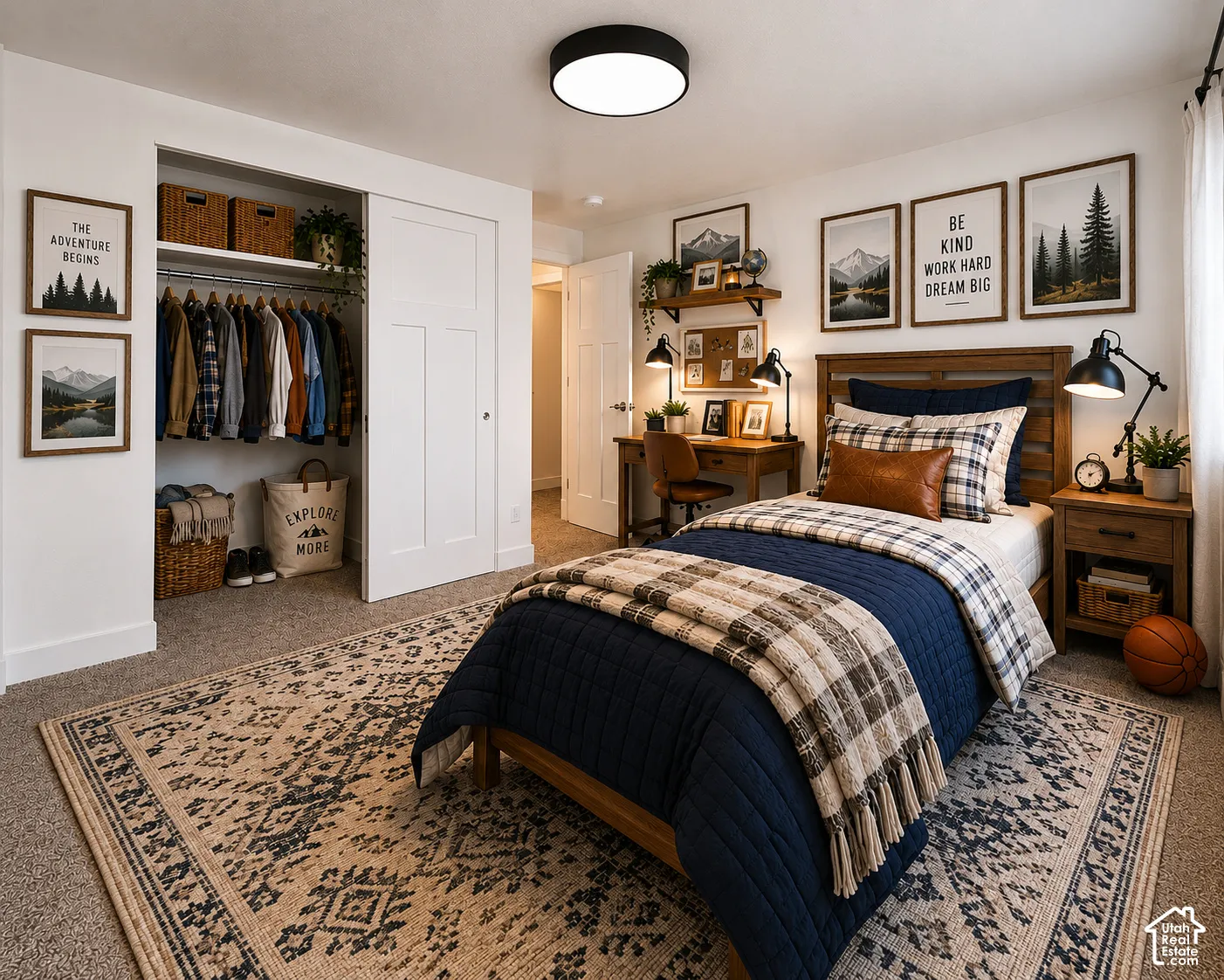 Bedroom featuring neutral carpeting, a sliding door closet with built-in shelving, a solid-core interior door, and a modern black flush-mount ceiling fixture