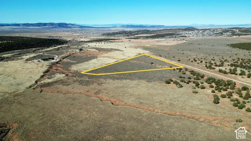 Expansive acreage featuring native desert vegetation and mountain terrain