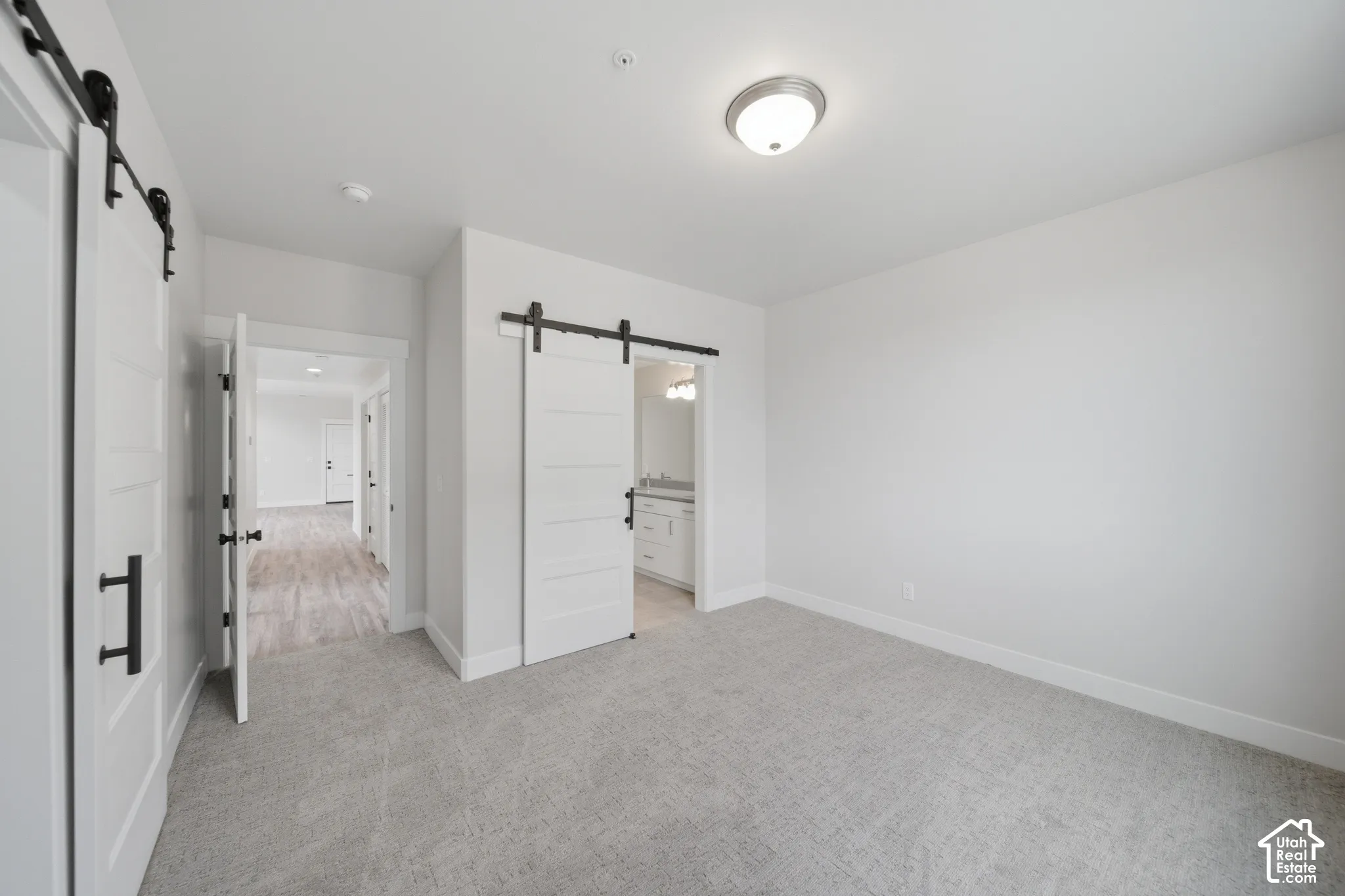 Light-toned carpeting throughout