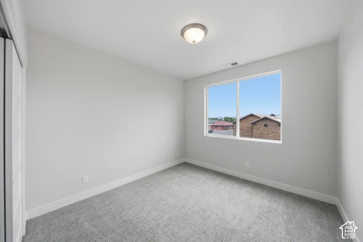 Light gray carpeting with an abstract pattern