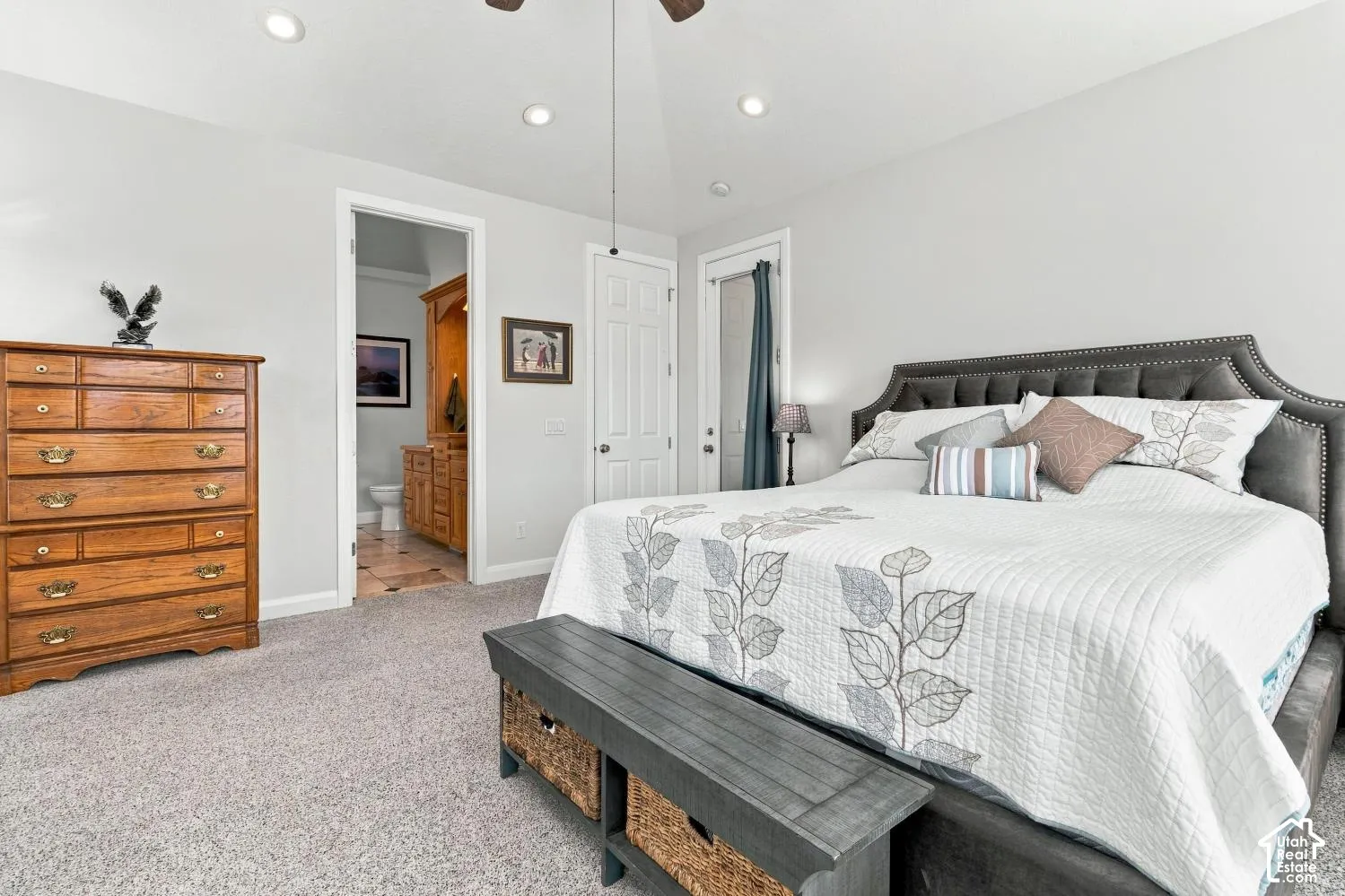 Vaulted ceilings featuring recessed lighting and a central ceiling fan