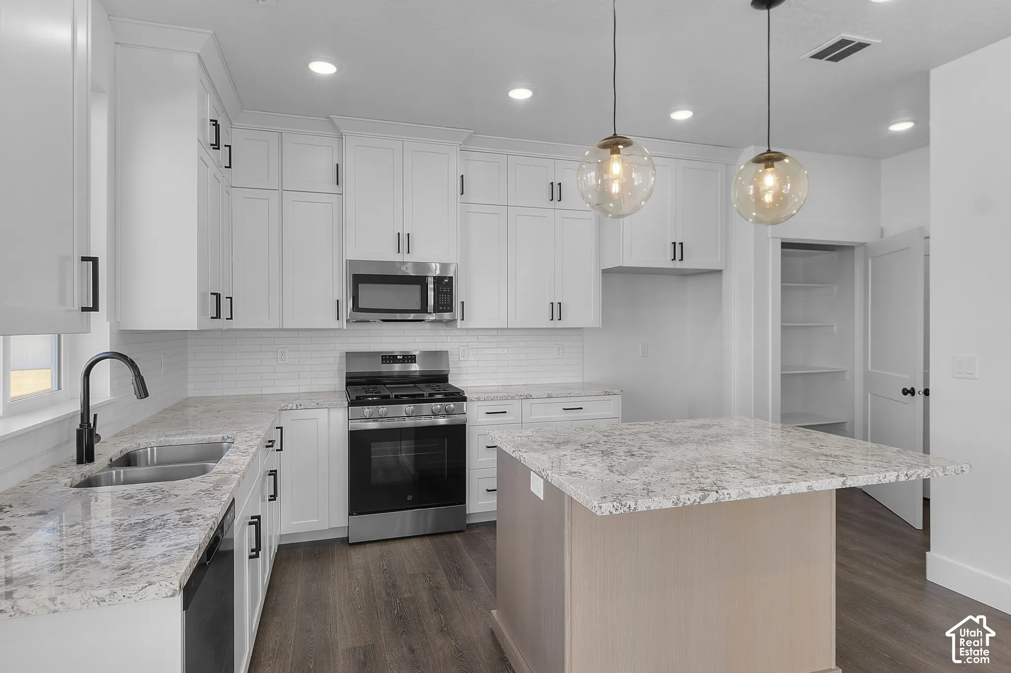 Kitchen-*Photos are of a similar home. Actual home will have different colors and selections.