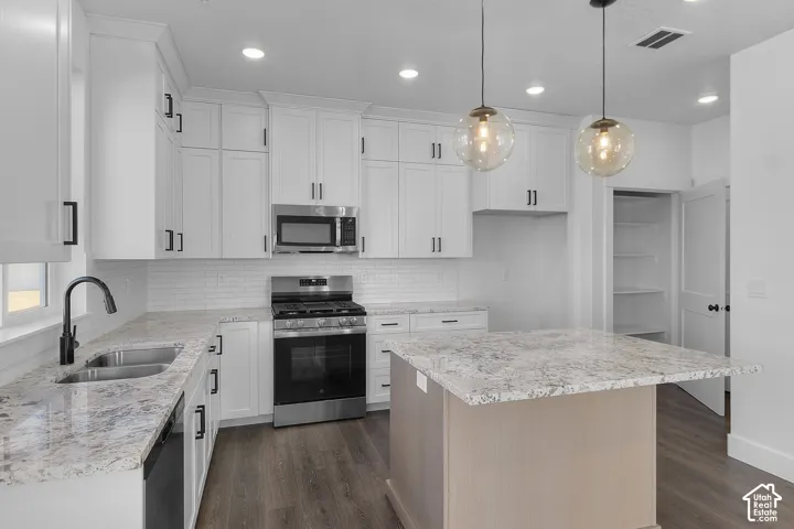 Kitchen-*Photos are of a similar home. Actual home will have different colors and selections.