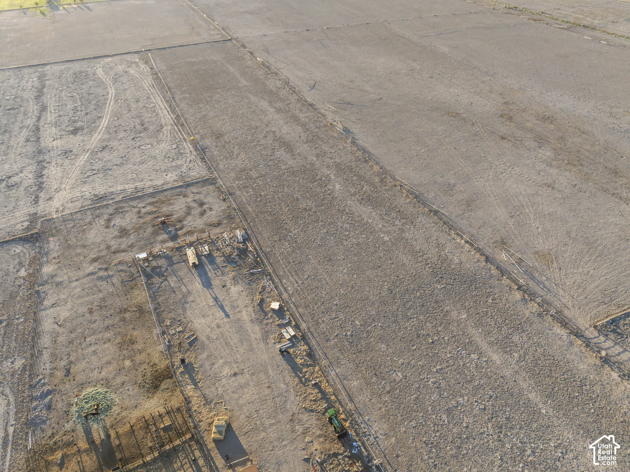 Expansive acreage featuring cleared land, established perimeter fencing, and open terrain