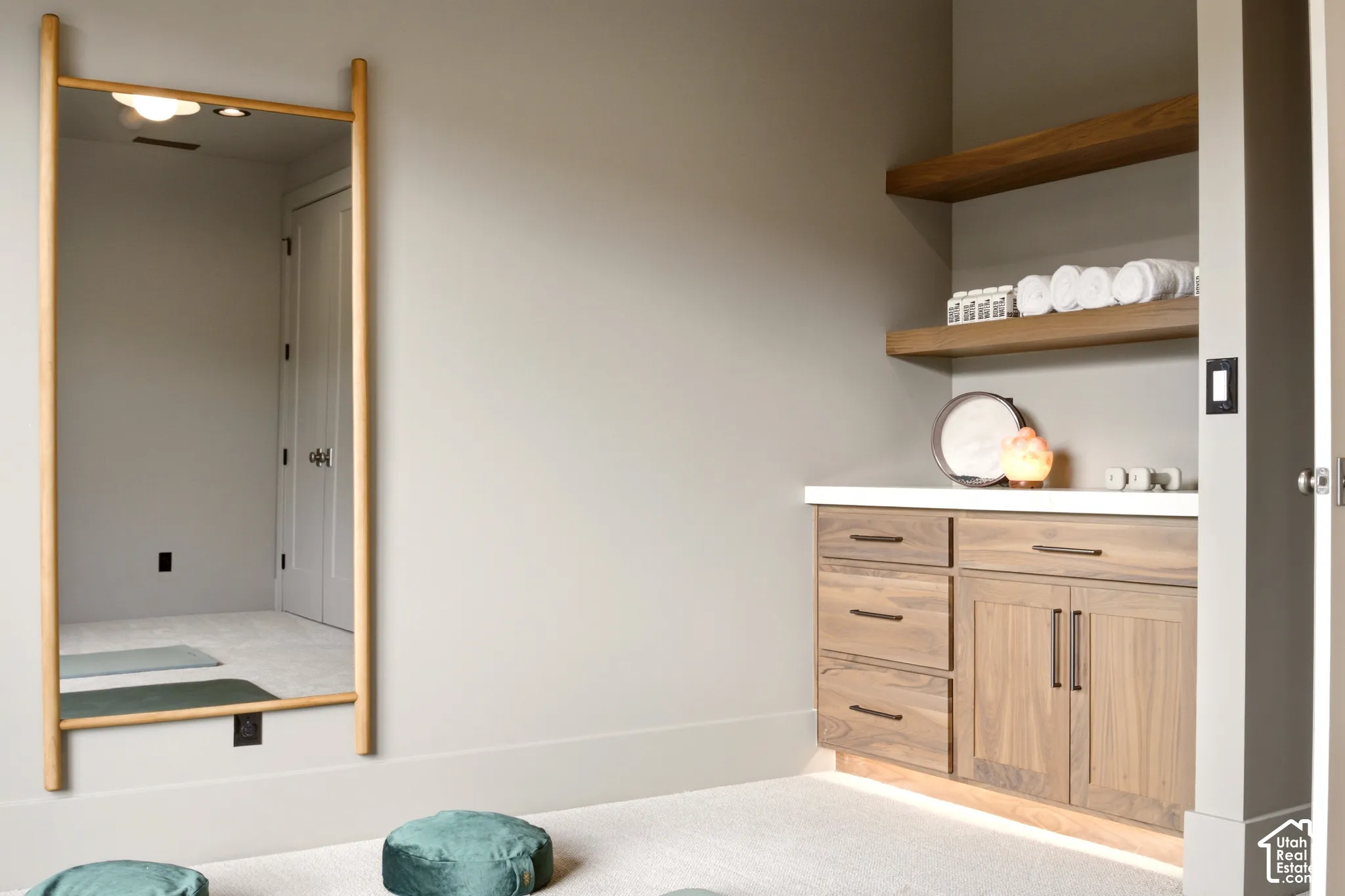 Walnut dry bar with ash grey hardware, Denali Quartzite countertop, and dual floating walnut shelving