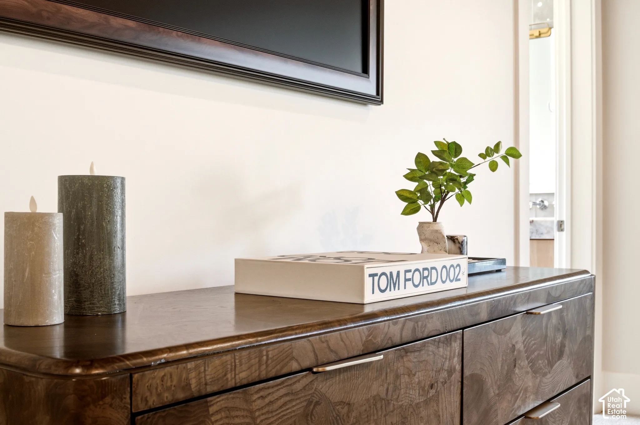 The Frame TV, Designer credenza, and Staging.