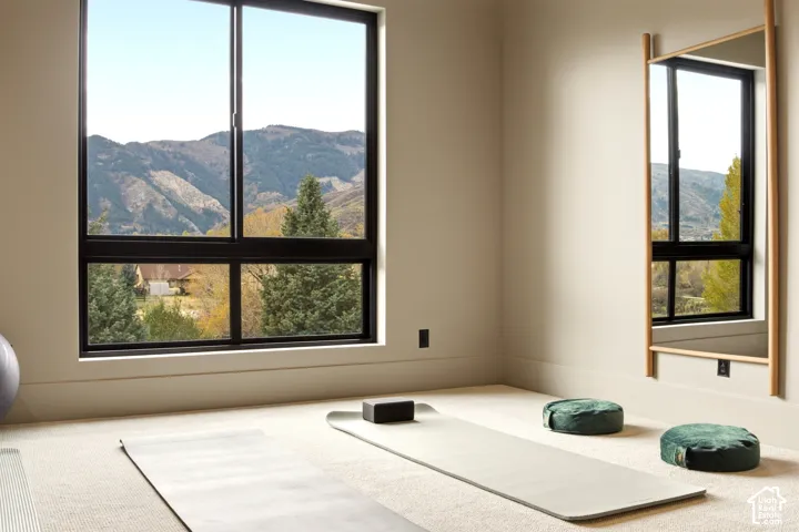Bedroom/ Flex Room with beautiful mountain views, neutral wall finishes and carpeted flooring