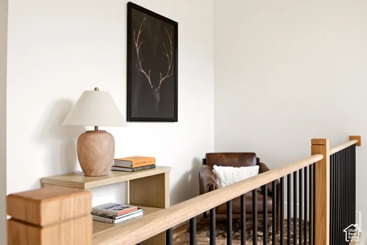 Intimate reading nook overlooking the entryway with mountain views
