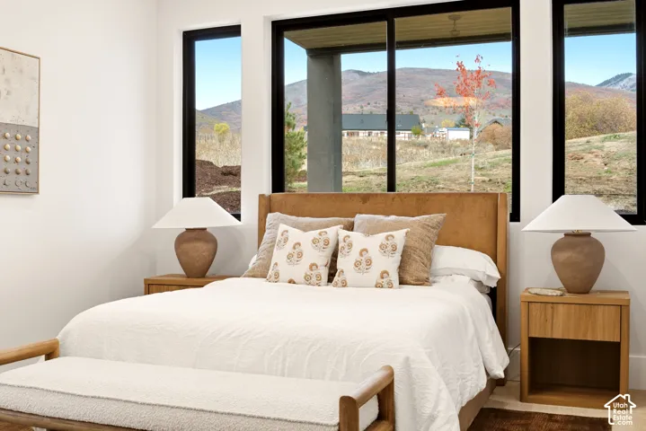 Main level Guest Suite featuring mountain scenery and expansive windows