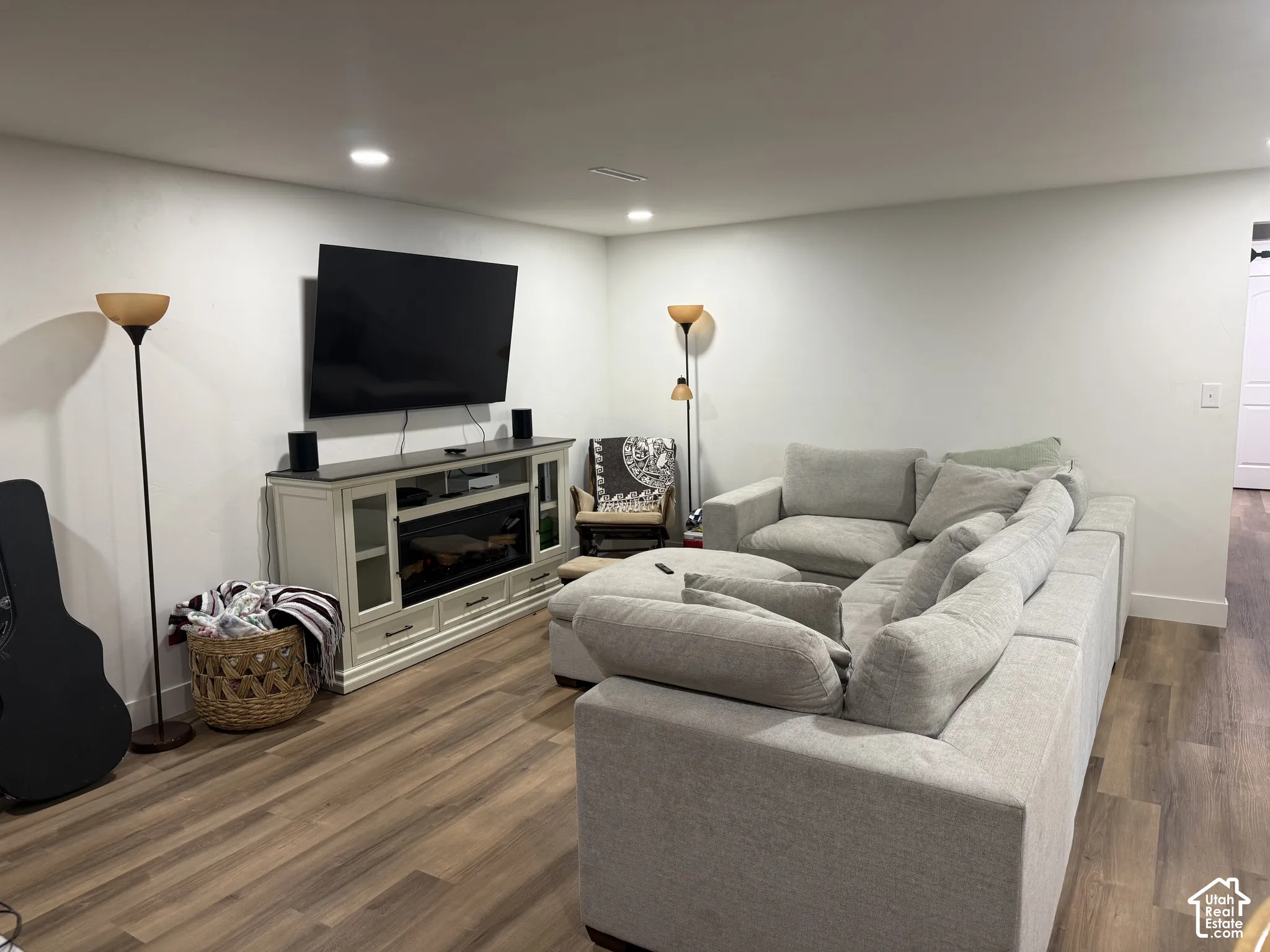 Interior space featuring wood-finish flooring and recessed lighting