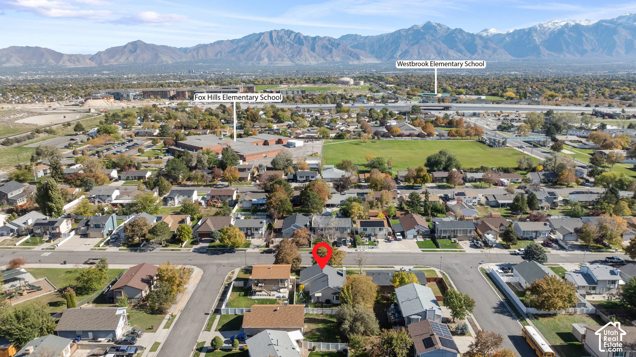 Aerial perspective featuring residential lot placement and mountain range backdrop