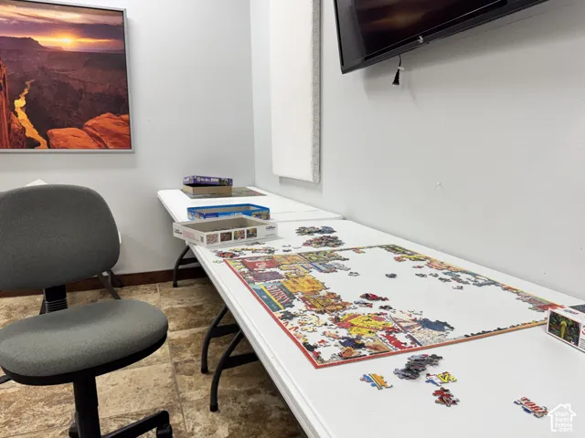 Neutral-toned walls and large-format tile flooring