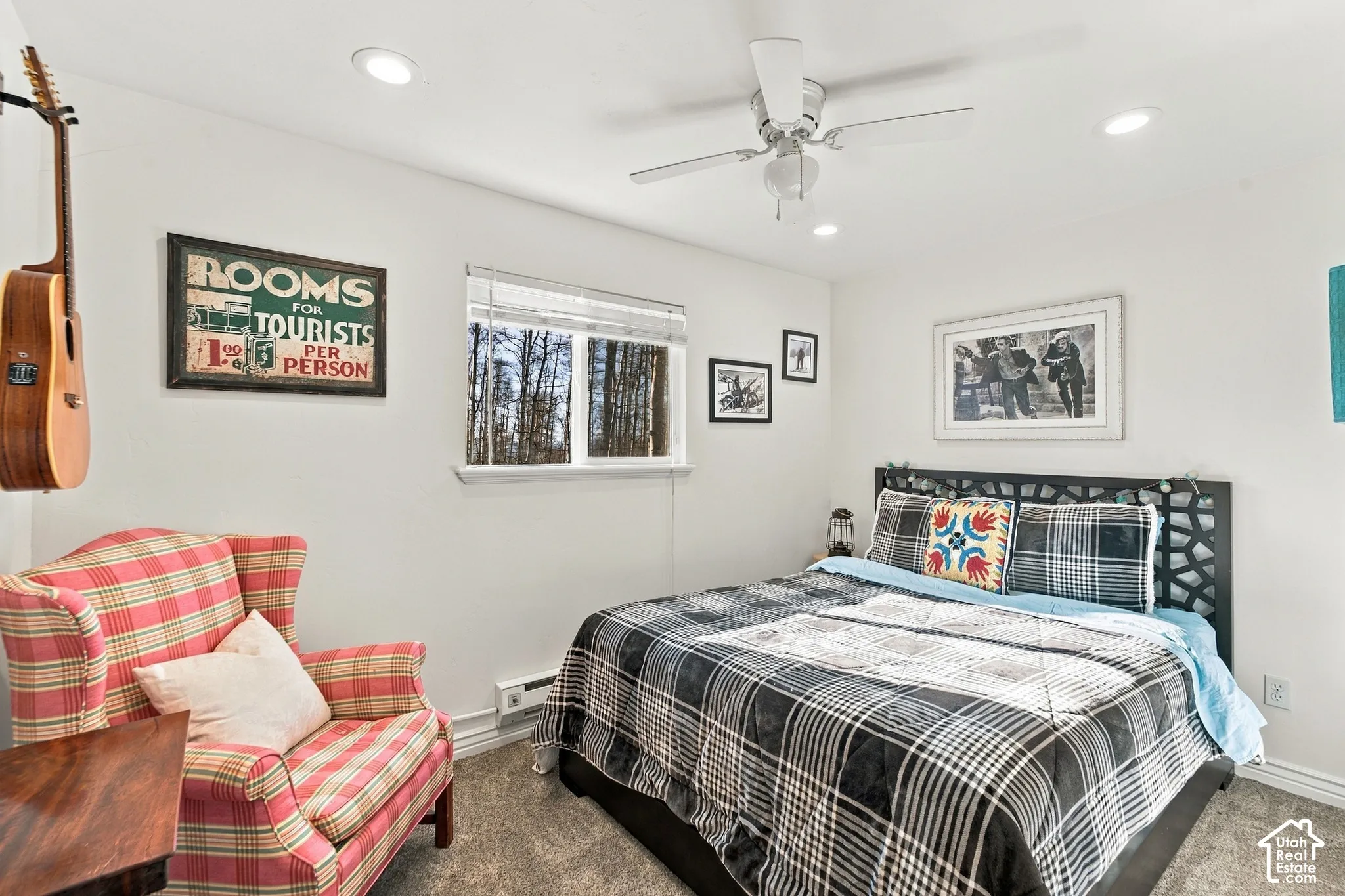 Neutral-toned interior featuring recessed lighting, a white ceiling fan, and carpeted flooring