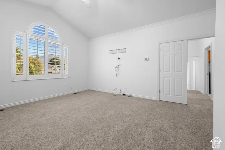 Primary Bedroom with a multi-panel door looking into the hallway