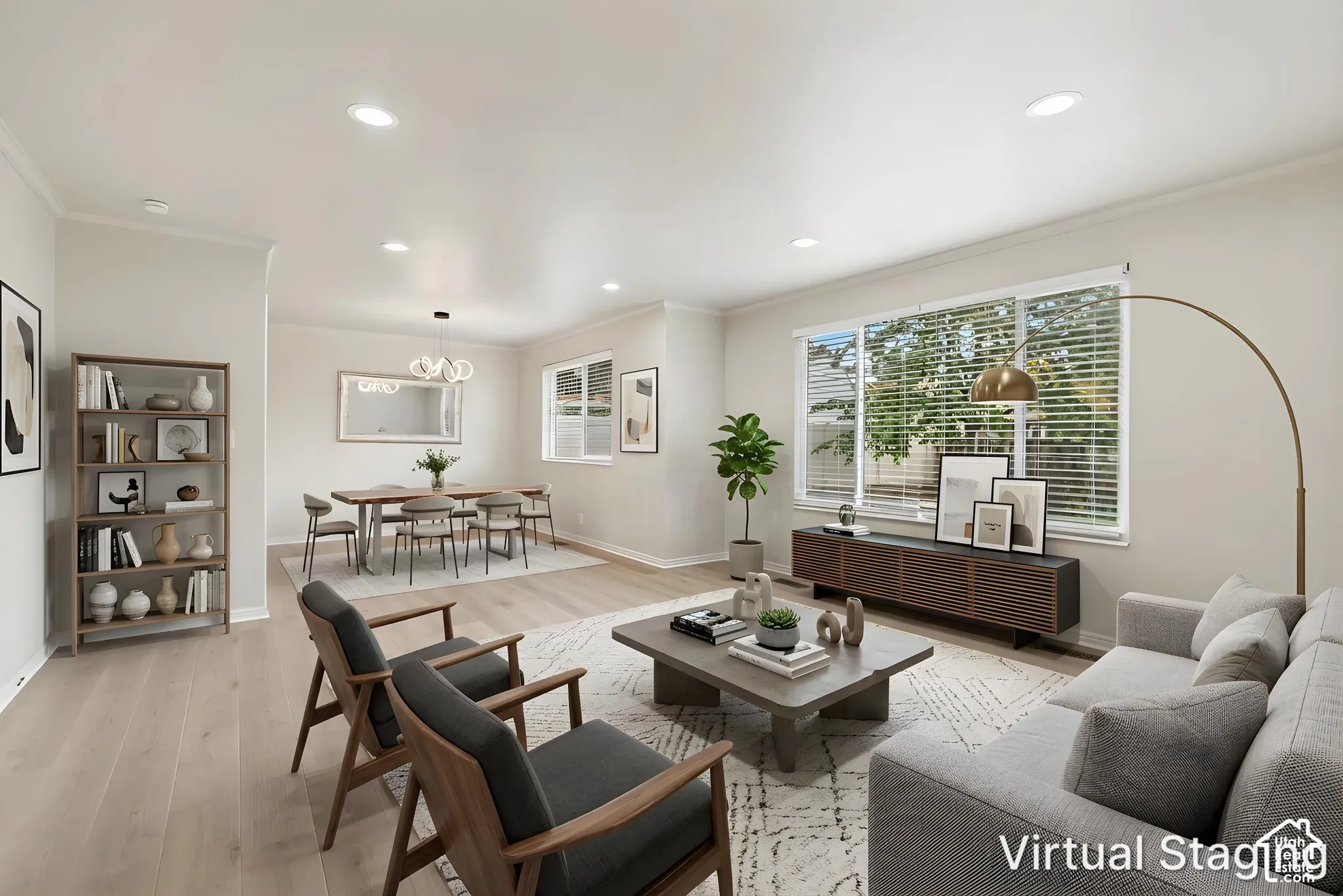 Open-concept interior featuring wood-finish flooring, recessed lighting, and expansive windows