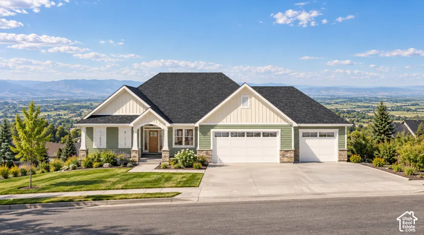 Rendering! Exterior featuring vertical and horizontal siding, stone veneer accents, an asphalt shingle roof, a covered entryway, and a multi-car garage