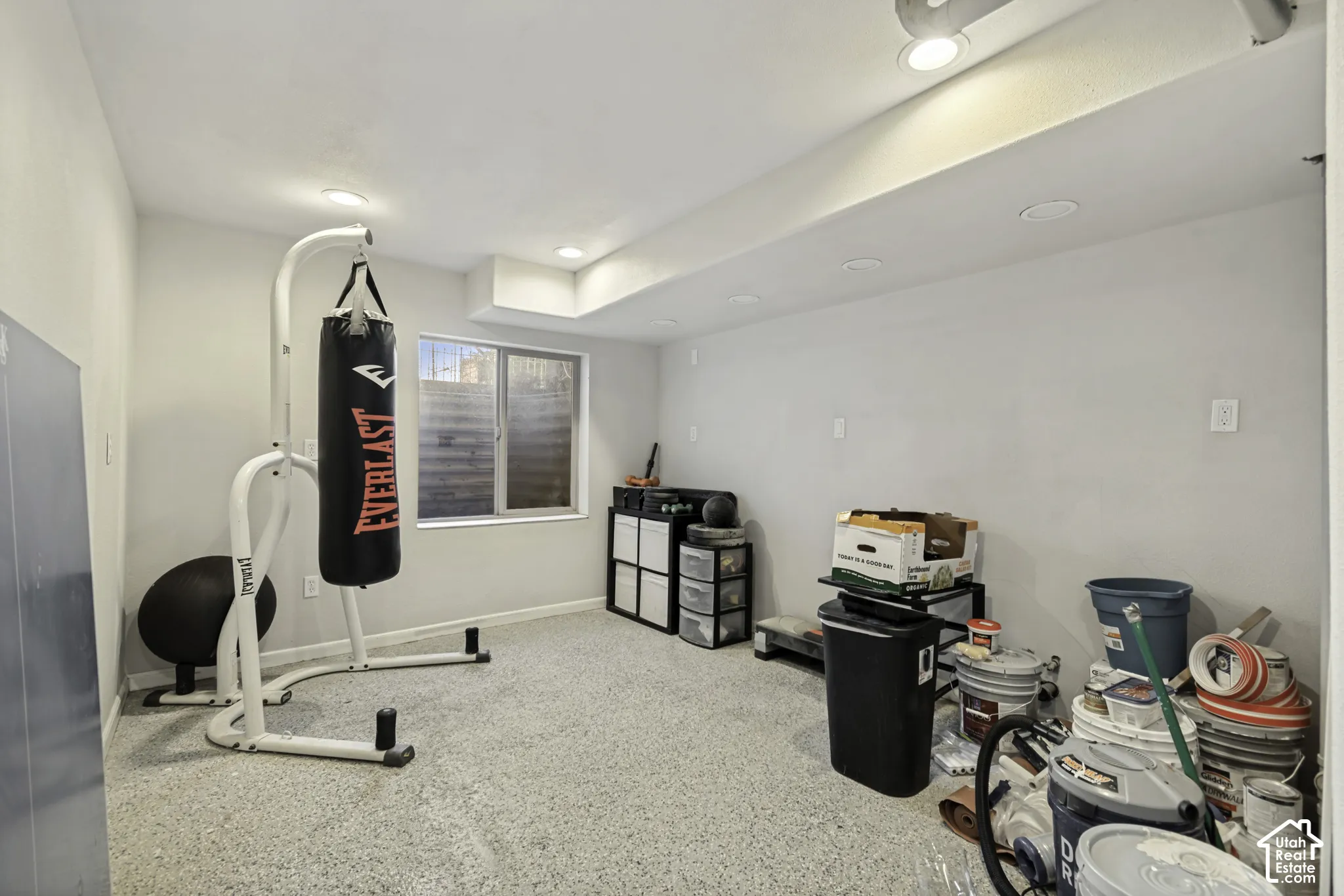 Interior space featuring recessed lighting, a single-pane window, and high-durability epoxy flooring