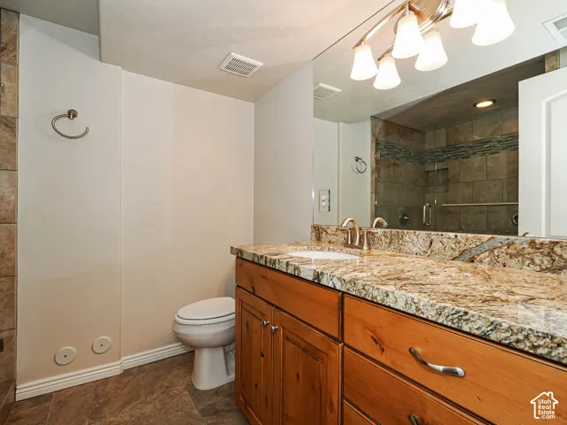 3/4 bathroom downstairs with granite countertops