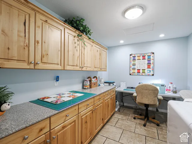 Craft room main floor, great cabinet space