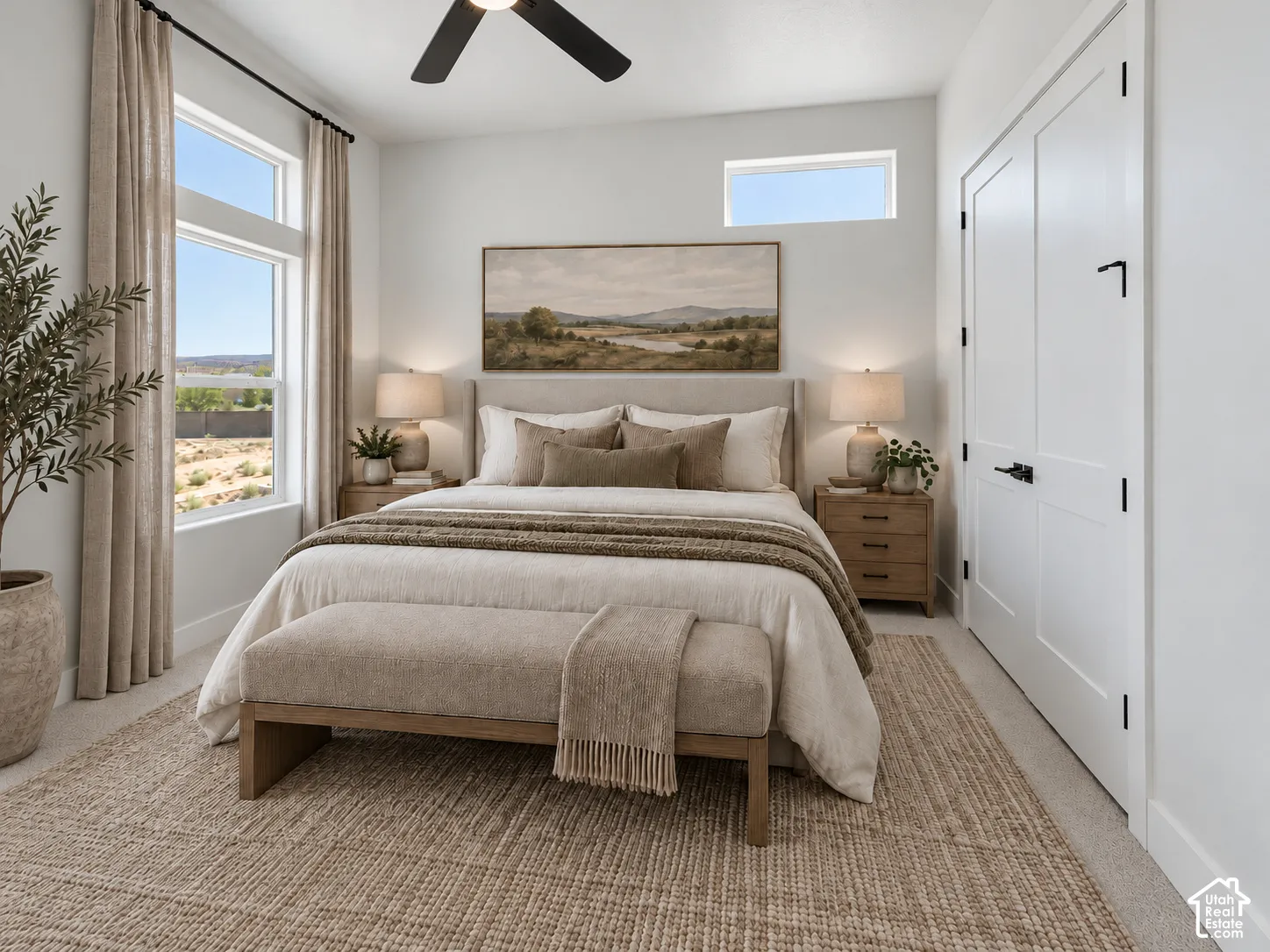 Bedroom featuring oversized windows, a clerestory window, double-door closet with matte black hardware, and a ceiling fan