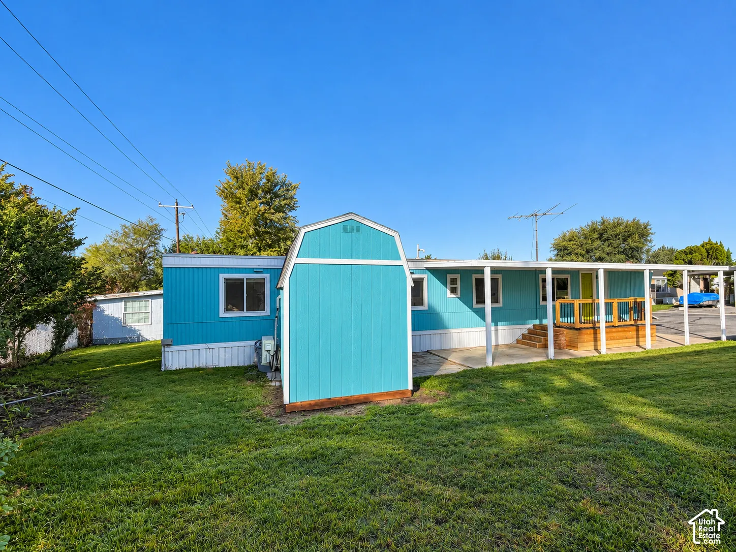 backyard view from south east corner of the shed and covered porch