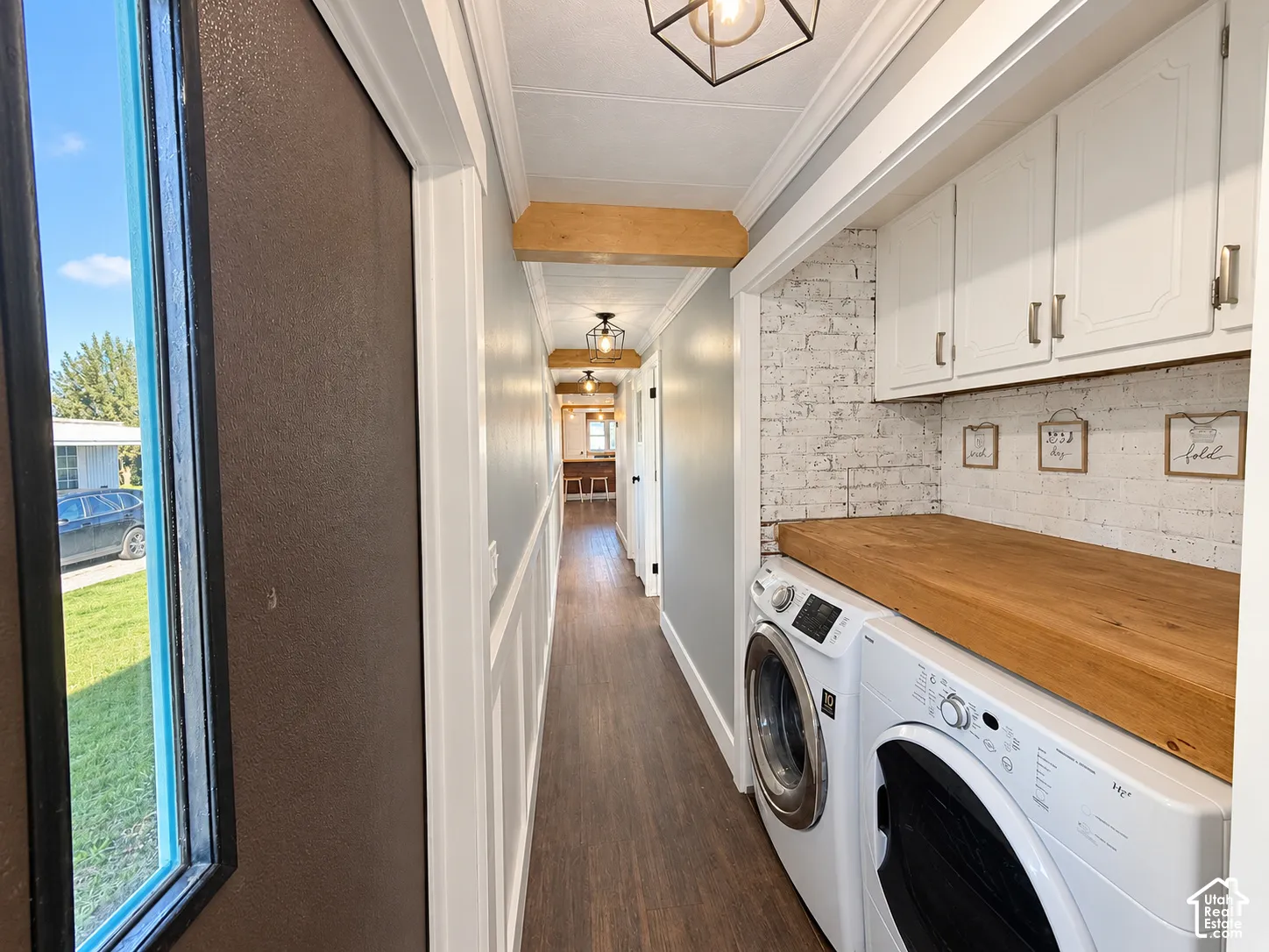 Laundry in hall is adjacent to back door